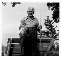 Harry Green w fish aug 1956.jpg